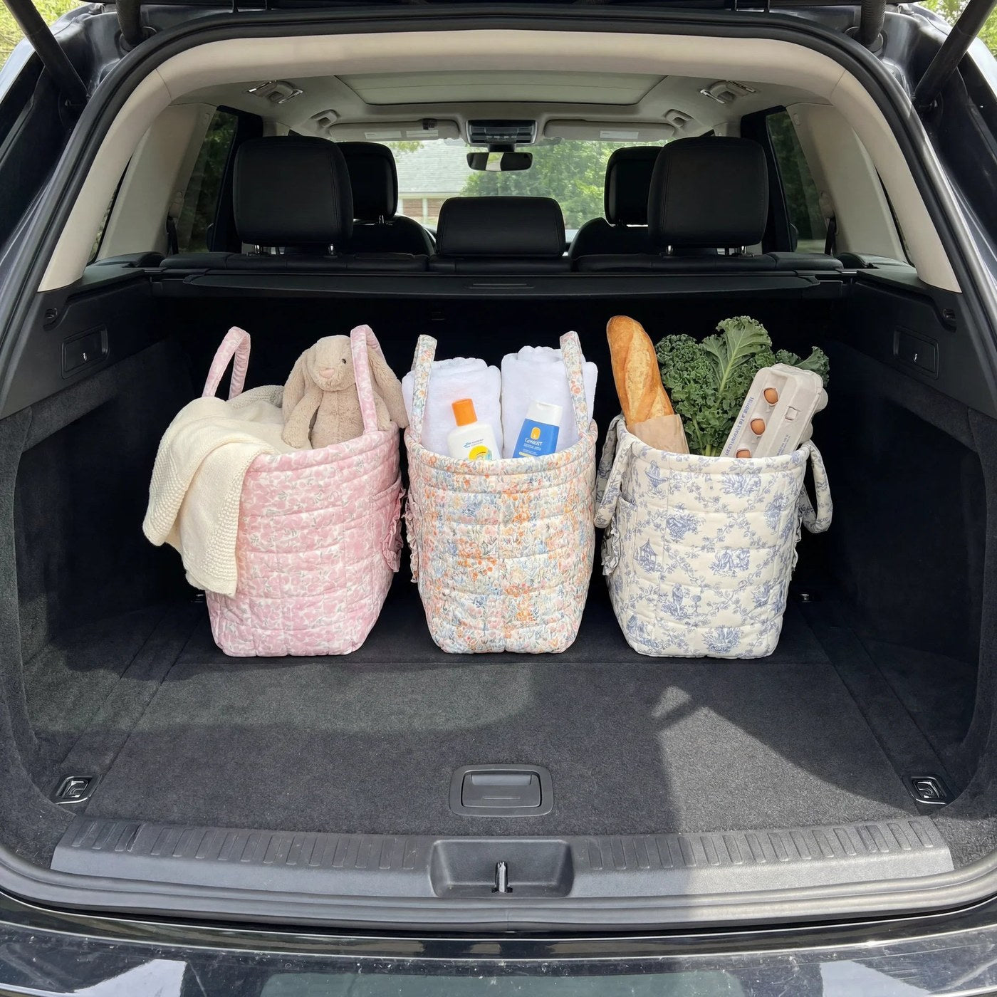 Three Bobbin baskets keeping the car boot organised