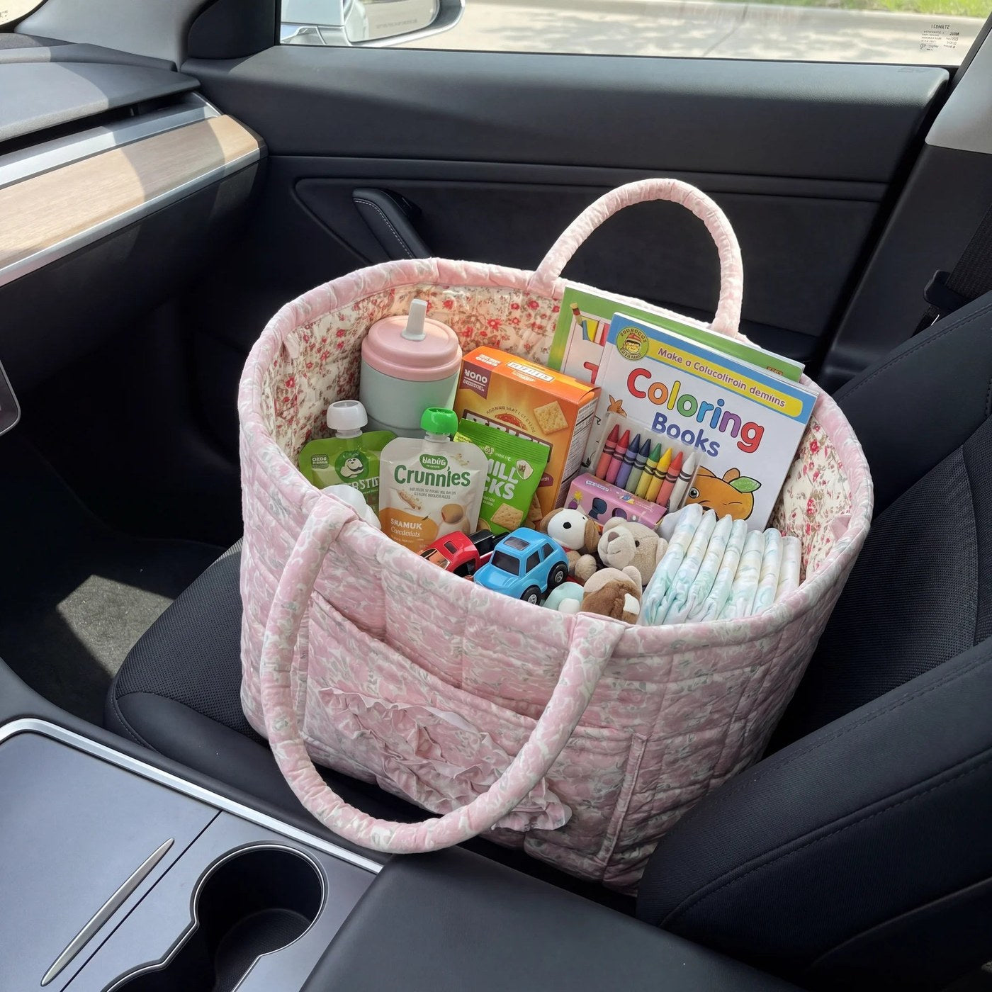 Bobbin basket on the car seat, filled with everyday bits